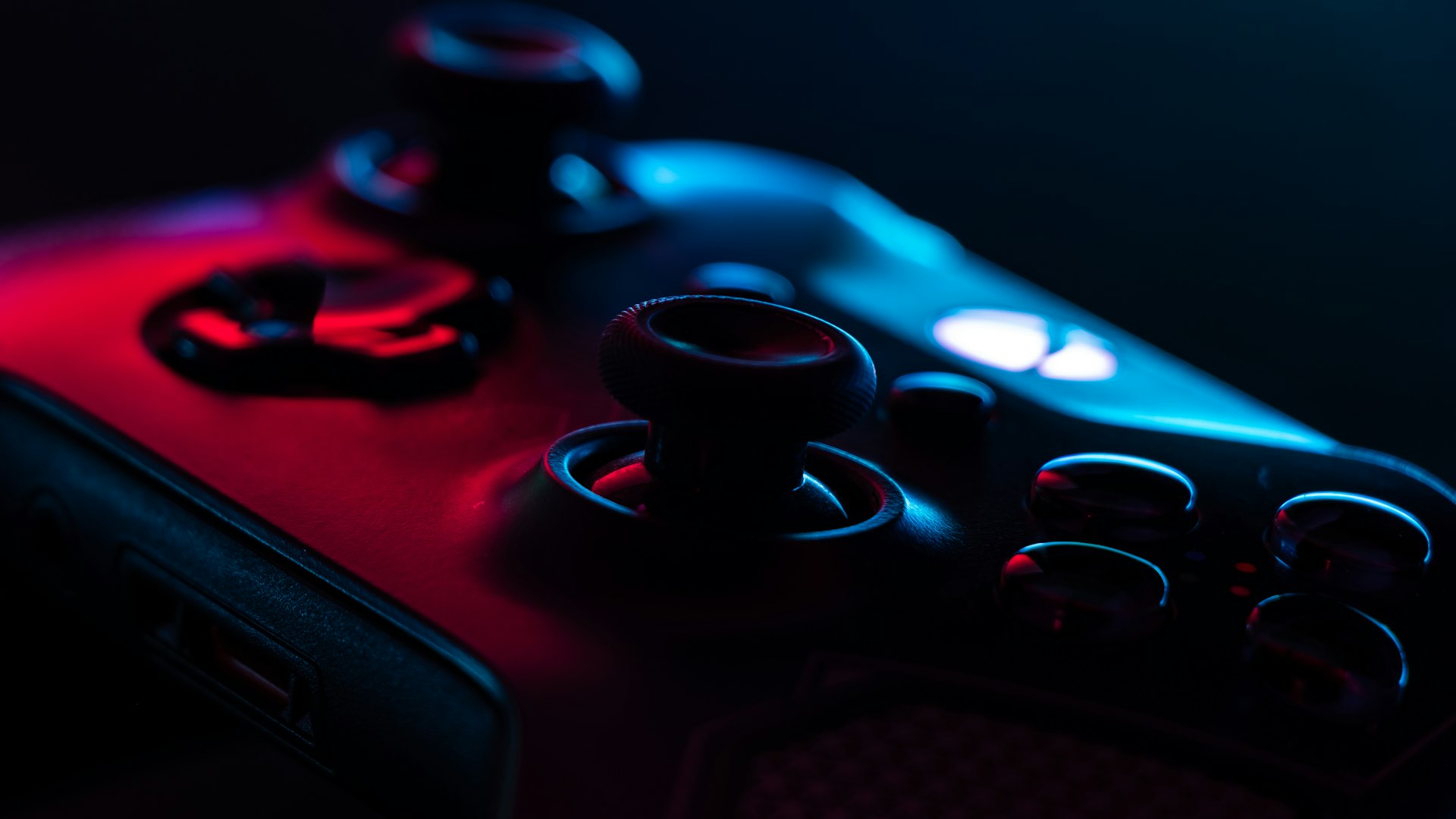 Gaming setup with controller and glowing screen